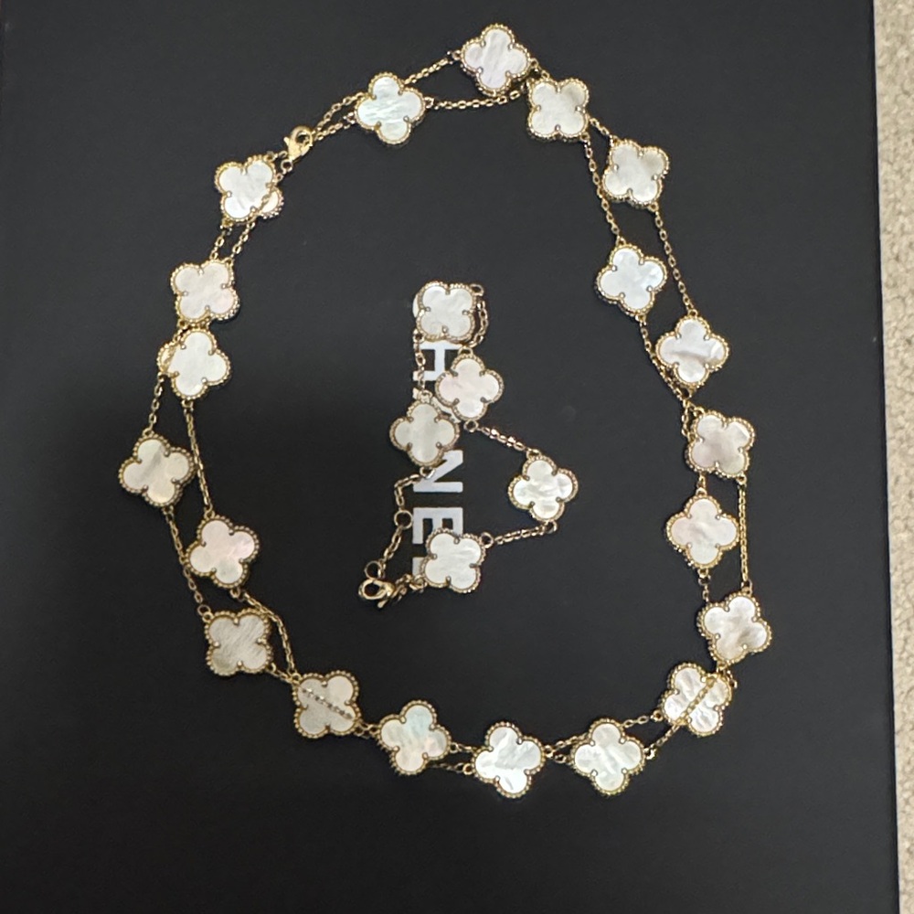 Elegant Gold and White Floral Necklace and bracelet